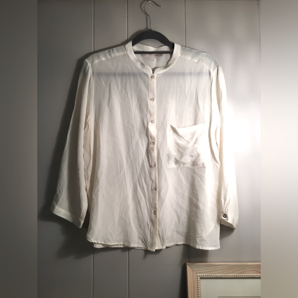 Zara basics cream colored button down shirt size Large.